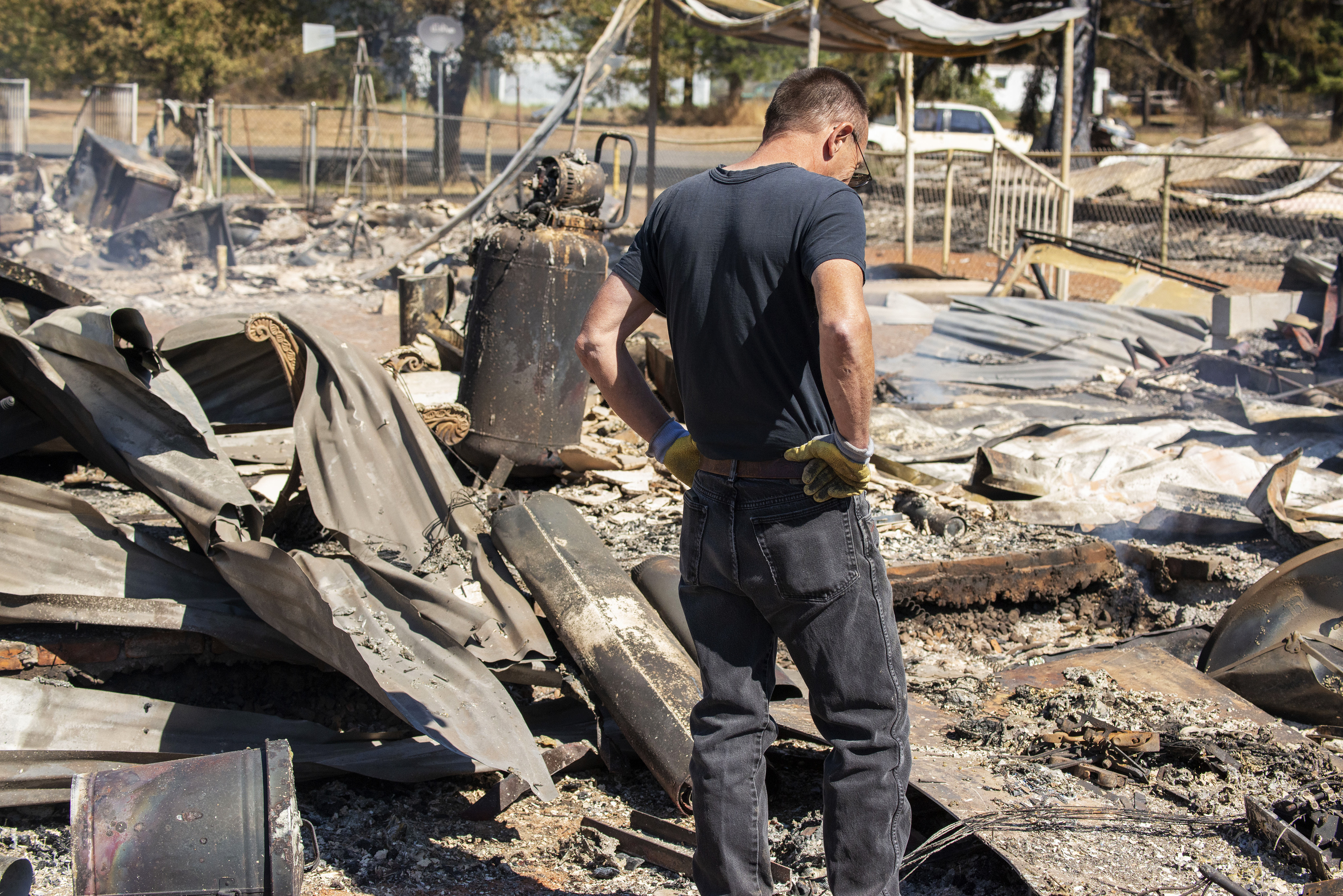 Jim Murray, 59, surveys his house in Malden, Washington, that was destroyed by 2020 wildfire. Jim Murray, 59, surveys his house in Malden, Washington, that was destroyed by 2020 wildfire.