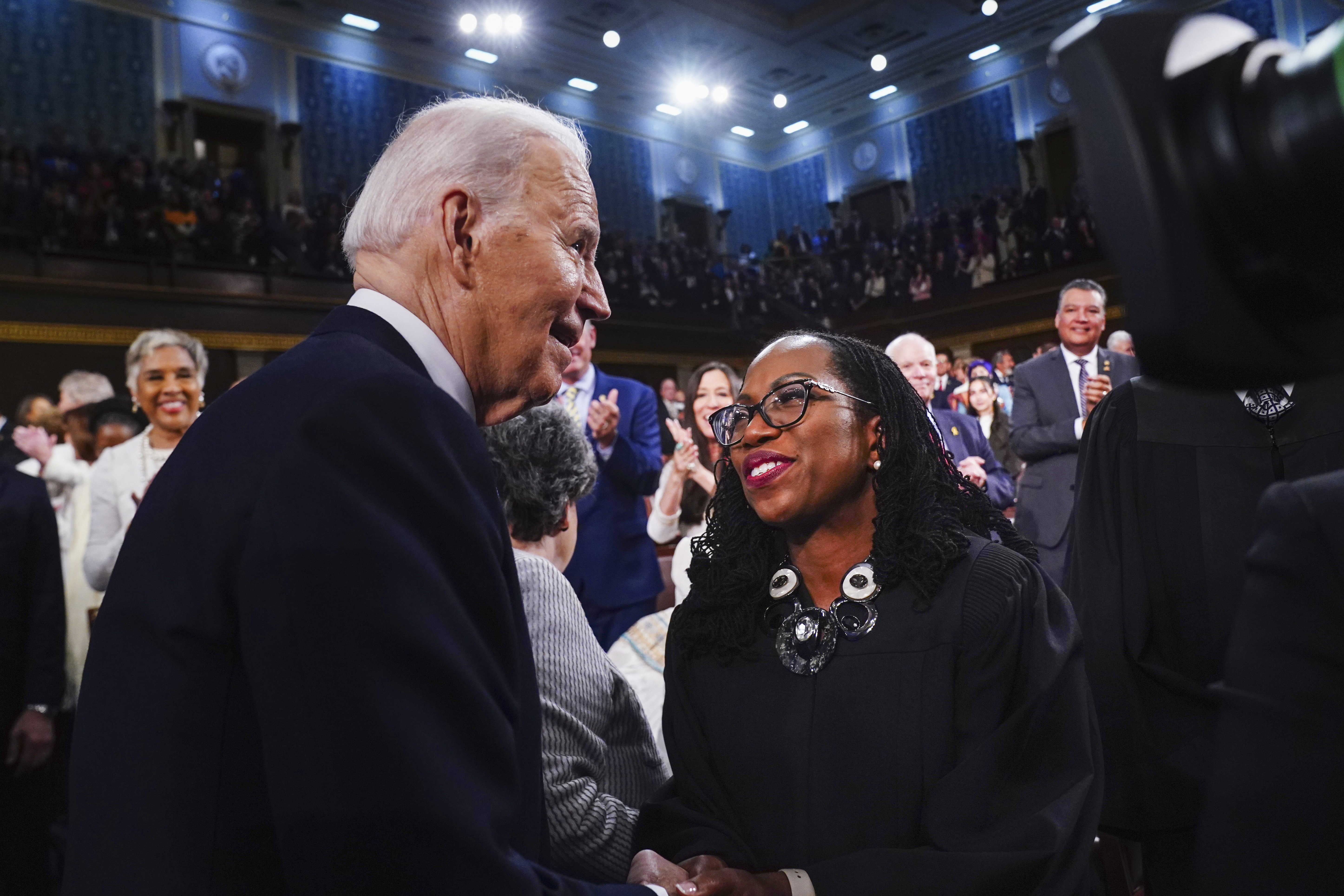 President Joe Biden greets Justice Ketanji Brown Jackson. President Joe Biden greets Justice Ketanji Brown Jackson.